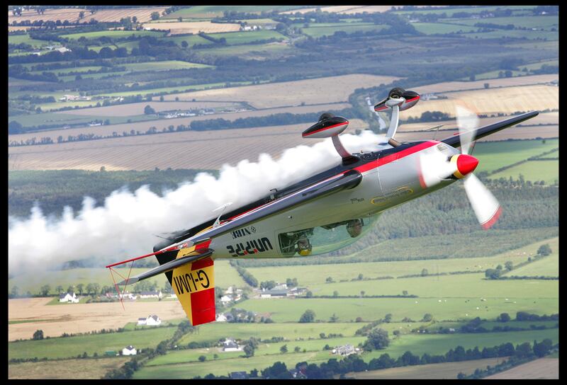Pilot Eddie Goggins with reporter Eoin Butler flying upside down in an Extra 300L aircraft over Kilrush, Co Kildare. Photograph: Brenda Fitzsimons