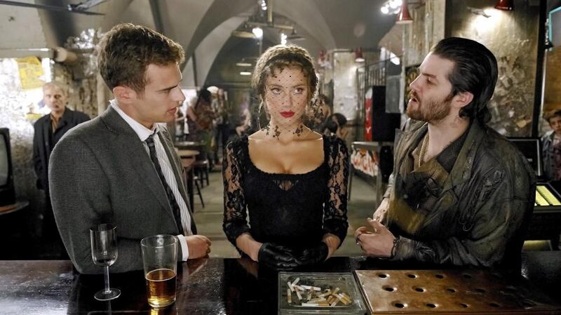 Amber Heard as Nicola Six, with Theo James (left) as Guy Clinch and Jim Sturgess as Keith Talent in Mathew Cullen’s film of London Fields (2018). Photograph: Steffan Hill/Allstar/Head Gear Films