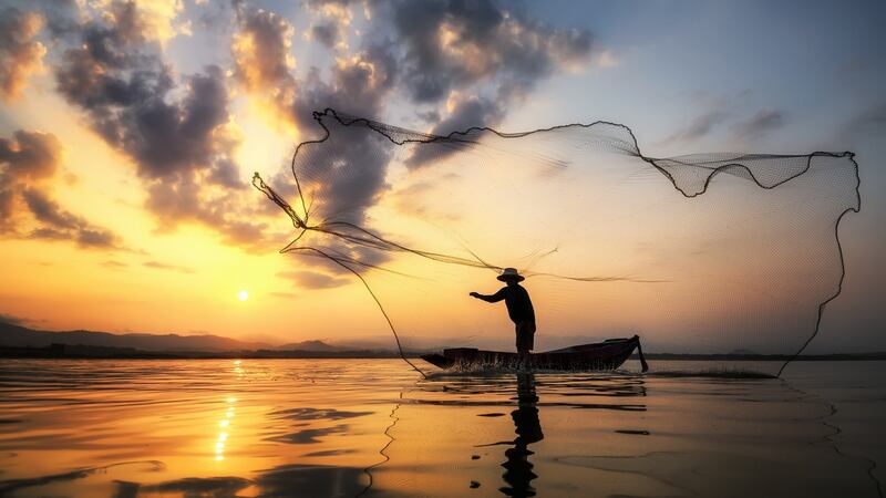 Fishermen get to work on the Rangoon river
