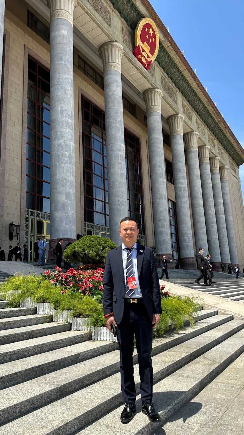 Huade (Perry) Chen outside the Great Hall of the People in Beijing in May 2023

