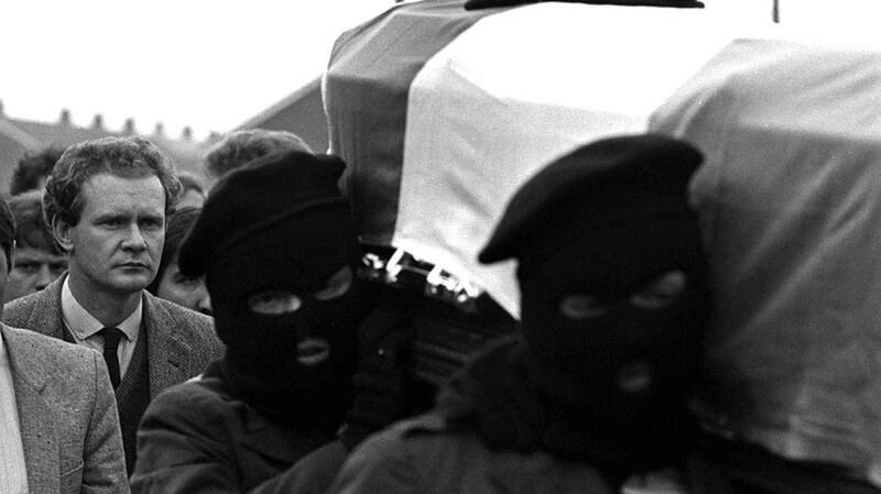 Martin McGuinness (left) follows the coffin of IRA man Charles English in Derry in 1984. Photograph: Pacemaker
