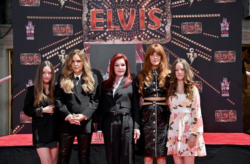 Harper Vivienne Ann Lockwood, Lisa Marie Presley, Priscilla Presley, Riley Keough and Finley Aaron Love Lockwood attending a handprint ceremony for the Presley family after the film Elvis was released in 2022. Photograph: Axelle/Bauer-Griffin/FilmMagic