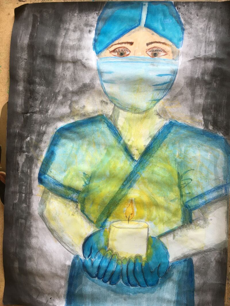 Christopher Wong-Lye, aged 10.
'I feel worried every time my mom goes grocery shopping. I am afraid she might catch Covid 19. I am grateful for the health care workers who risk their lives to fight Covid 19. The title of my art piece is Shine Your Light.'