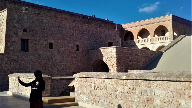 A tourist takes a selfie at St Gabriel’s Monastery in southeastern Turkey. Photograph: Stephen Starr