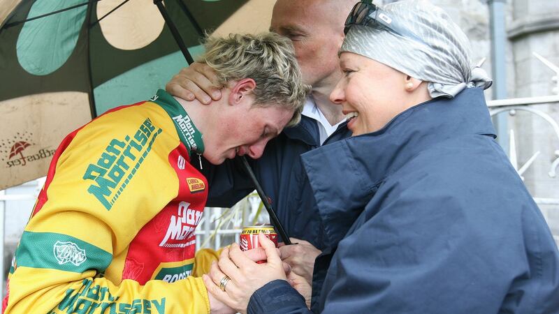 An emotional Sam Bennett with his parents Michael and Helen after his win in stage 7 of the 2009 FBD Insurance Rás in Clara, Co Offaly. Photograph: Lorraine O’Sullivan/Inpho