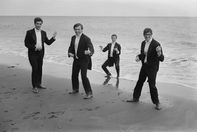Cliff Richard and The Shadows pictured together on a beach in the Canary Islands. Photograph: McCabe/Daily Express/Hulton Archive