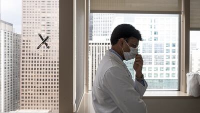 Dr Ankit Bharat during a check-up with Mayra Ramirez, July 29th. Photograph: Sebastian Hidalgo/The New York Times