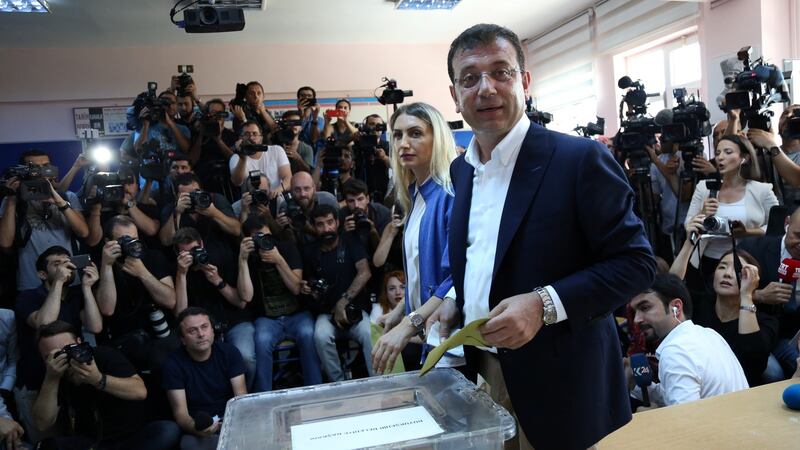 Ekrem Imamoglu, mayoral candidate of the opposition Republican People’s Party (CHP) casts his ballot at a polling station in Istanbul on Sunday. Photograph: Reuters
