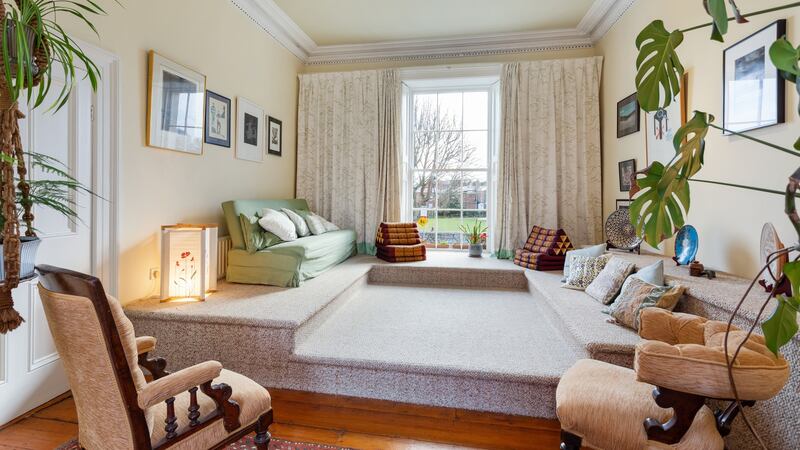 Raised carpeted  platform in one of the main reception rooms.