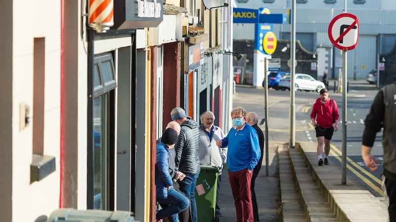 A queue outside a barber shop in Enniskillen, Co Fermanagh. Photograph: Ronan McGrade