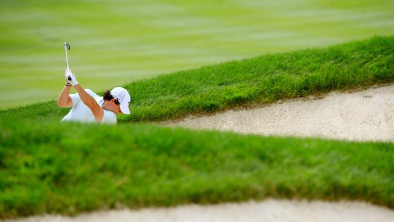 Rory McIlroy of Northern Ireland hits out of a bunker on the second hole during the second round of the World Golf Championships-Bridgestone Invitational at Firestone Country Club South Course in Akron, Ohio. Photograph:  Sam Greenwood/Getty Images