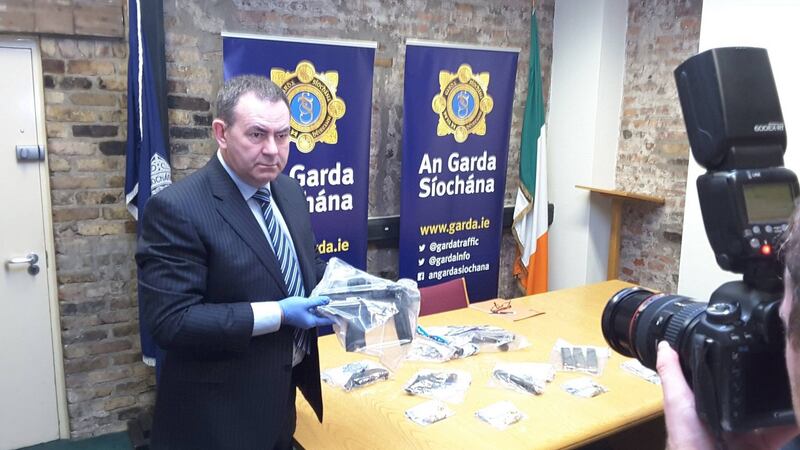 Gardaí display the weapons and ammunition seized in Cabra, Co Dublin. Photograph: An Garda Síochána