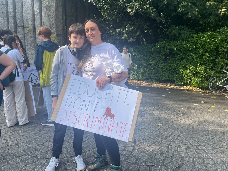 DSPCA volunteer Tara Keogh and son Tadhg at the XL bully protest in Dublin on 07/09/2024