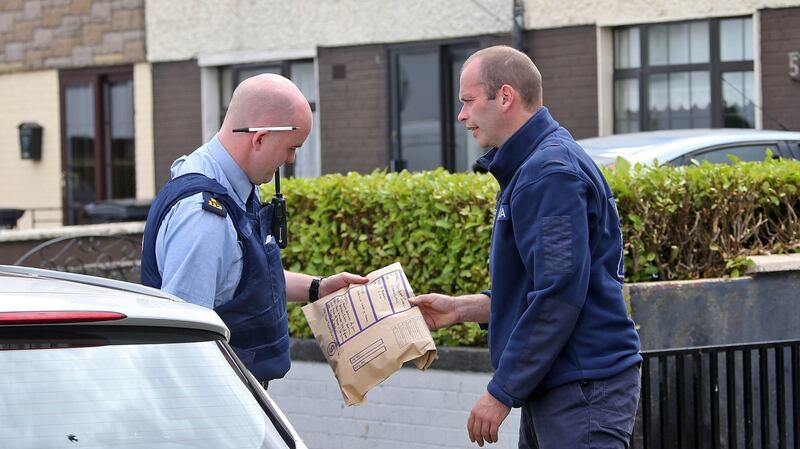 Gardaí at the scene on Belcamp Green, Coolock this morning where a man was stabbed with what is believed to be a broken bottle or glass in a house shortly after midnight last night. Photograph: Colin Keegan/Collins Dublin.