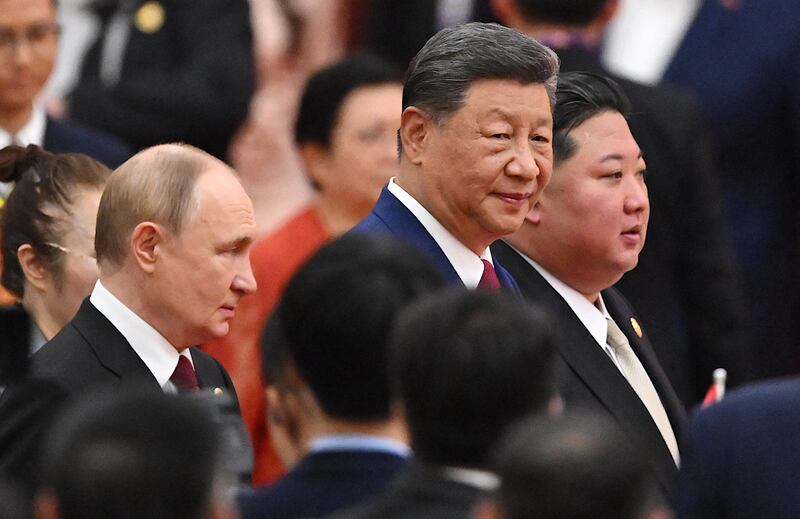 China's president Xi Jinping, North Korea's leader Kim Jong-un and Russia's president Vladimir Putin arrive for a reception in the Great Hall of the People, following the military parade. Photoraph: Jade Gao/ AFP