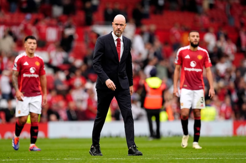 Manchester United manager Erik ten Hag walks off dejected after their 3-0 defeat to Liverpool at Old Trafford. Photograph: Nick Potts/PA Wire