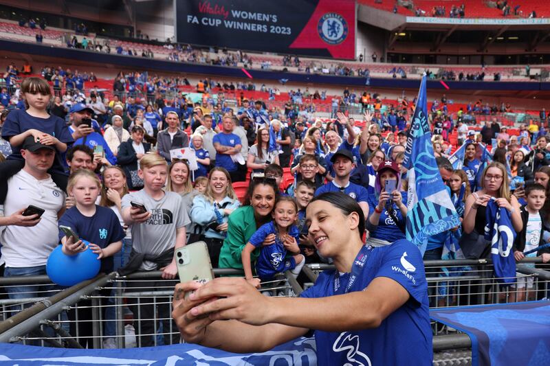 Chelsea's Australian striker Sam Kerr celebrates with supporters after winning the English Women's FA Cup final between Chelsea and Manchester United at Wembley Stadium on Sunday. Photograph: Adrian Dennis/AFP via Getty Images