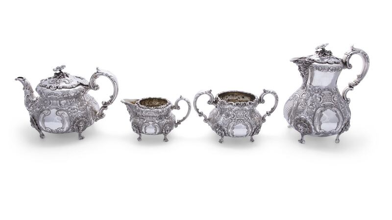 Irish Silver four piece coffee set with unusual cast human heads, €1,500-€2,000 Adam’s