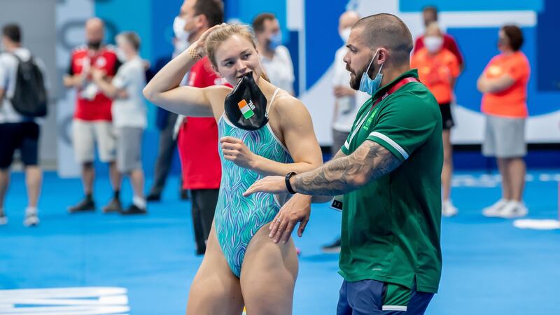 Mona McSharry with coach Benjamin Higson ahead of her final in Tokyo. Photograph: Morgan Treacy/Inpho