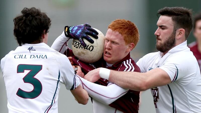 Kildare's David Hyland and Fergal Conway challenge Adrian Varley of Galway in Tullamore. Photograph: James Crombie/Inpho