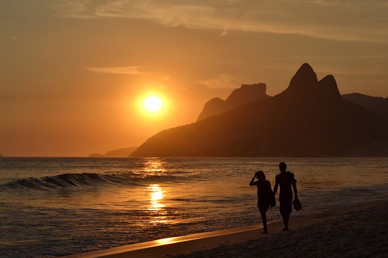 Sunset on the beach in Rio de Janeiro.  At this time of year, the city is not too hot and not too busy. Photograph: iStock
