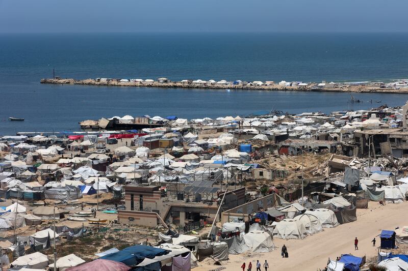 Tents are set up as temporary shelters for displaced Palestinians along the coastline of Gaza City on May 25th. Photograph: Omar Al-Qattaa/Getty Images
  