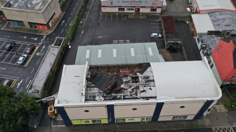 The Regal Centre/O'Keeffe Furniture on Davis Road in Clonmel, Co Tipperary, after part of the roof lifted off the building. Photograph: RTÉ