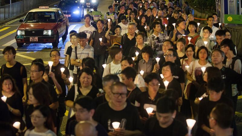 People march in Hong Kong to demand the release of Liu Xia, widow of deceased Chinese dissident and Nobel peace prize laureate Liu Xiaobo. Photograph: EPA