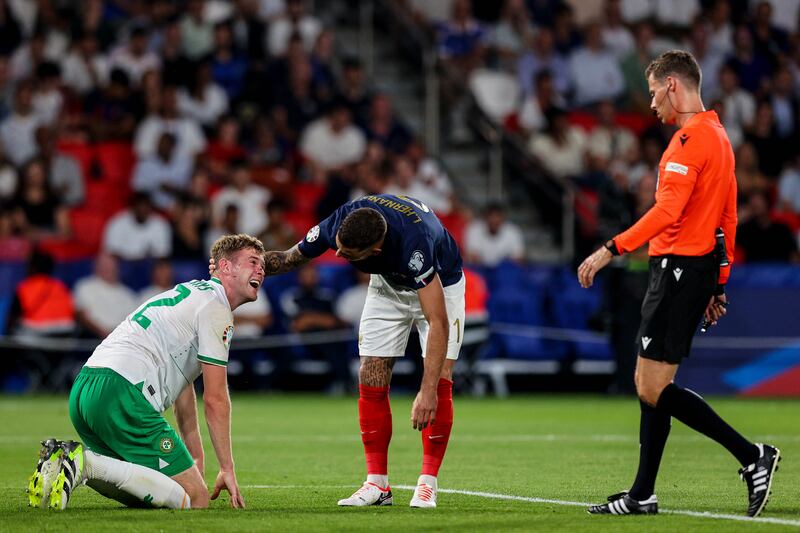 Ireland's Nathan Collins and France's Lucas Hernández. Photograph: Ryan Byrne