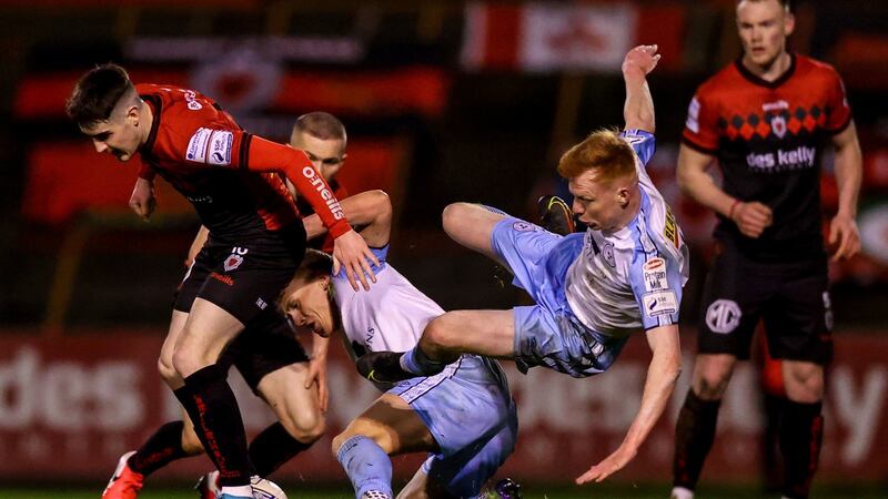 Bohemians’ Dawson Devoy collides with Brian McManus and Shane Farrell of Shelbourne during the SSE Airtricity League Premier Division match at  Dalymount Park. Photograph: Ben Brady/Inpho