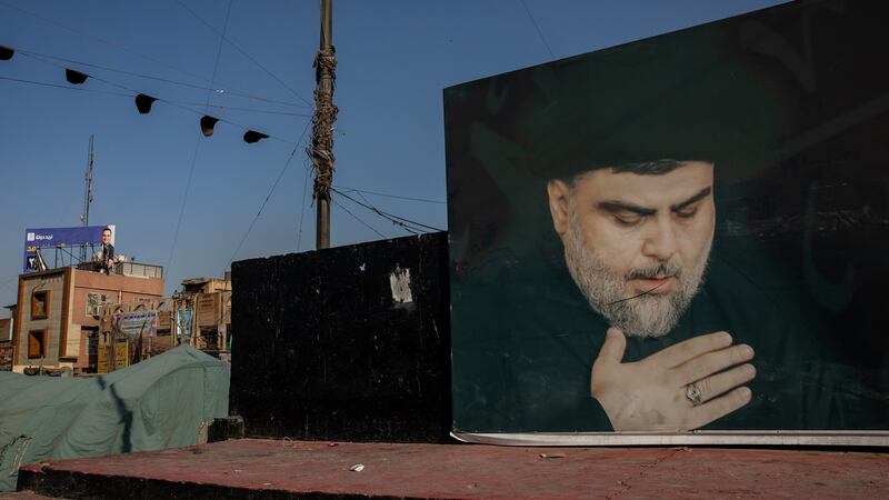 A poster of the Shia cleric Muqtada al-Sadr in Baghdad. Photograph: Andrea DiCenzo/New York Times
