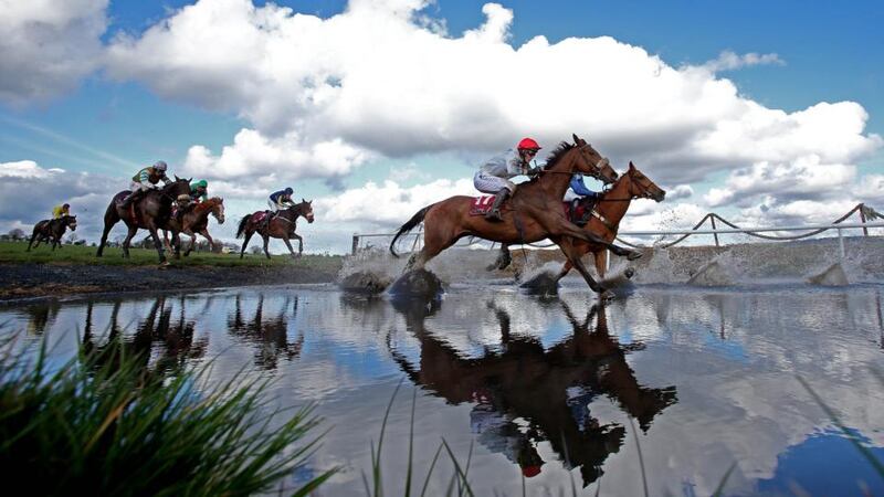 A general view of The Avon Ri Corporate & Leisure Resort Steeplechase for the La Touche Cup during Ladbrokes.com World Series Hurdle Day at the 2013 Festival at Punchestown. Photograph: Niall Carson/PA Wire