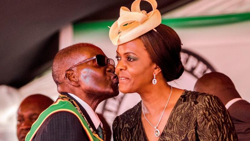 Mugabe resigns: the Zimbabwean president with his wife, Grace, during the country’s 37th Independence Day celebrations, in April. Photograph: Jekesai Njikizana/AFP/Getty