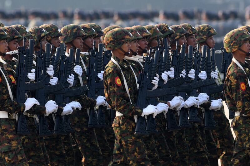 Myanmar soldiers take part in a parade to mark the country's Armed Forces Day. Photograph: STR/AFP/Getty