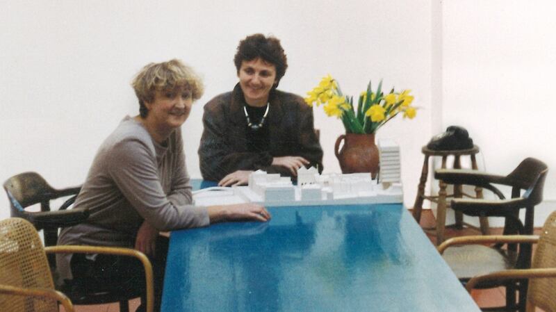 Yvonne Farrell and Shelly McNamara with a model of Temple Bar Square, one of their first major Dublin projects