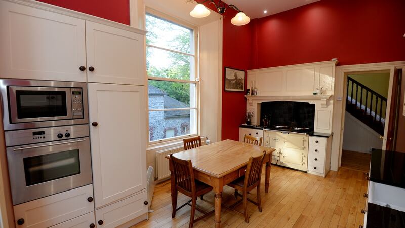 The kitchen in Dunmoe House features a warming Aga