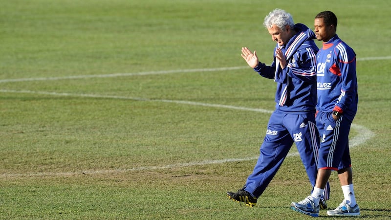 France boss Ramond Domenech and captain Patrice Evra before the start of what was supposed to be a training session at the Fields of Dreams stadium in Knysna on June 20th. Photograph: Franck Fife/AFP/Getty