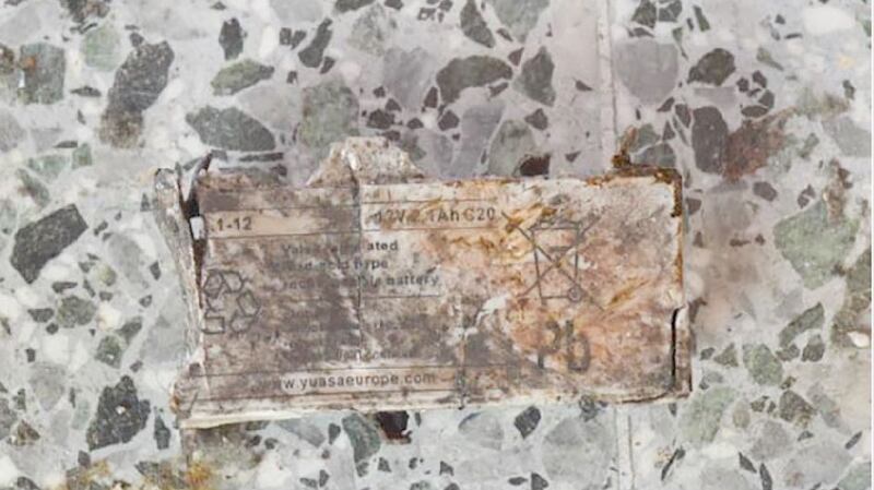 Bomb fragments from Manchester Arena show the 12-volt battery that was the possible power source of the bomb. Photograph: The New York Times