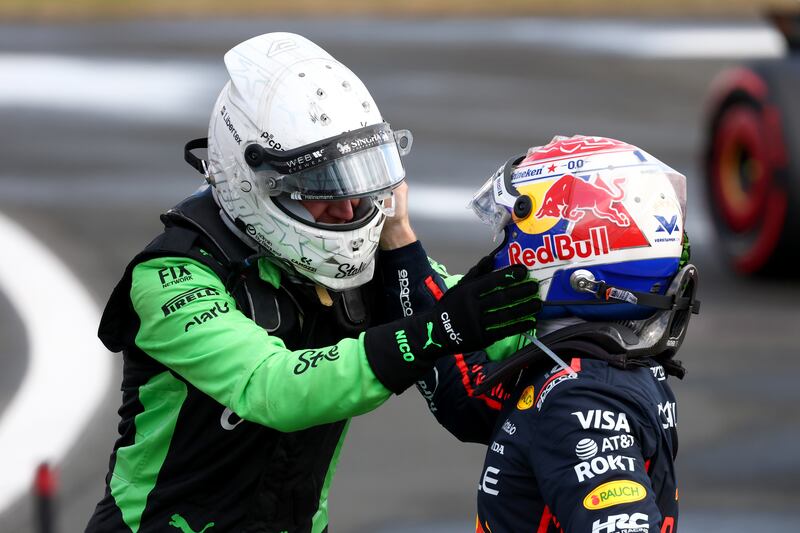 Red Bull's Max Verstappen (right) congratulates Nico Hulkenberg on his third-place finish. Photograph: Clive Rose/Getty Images