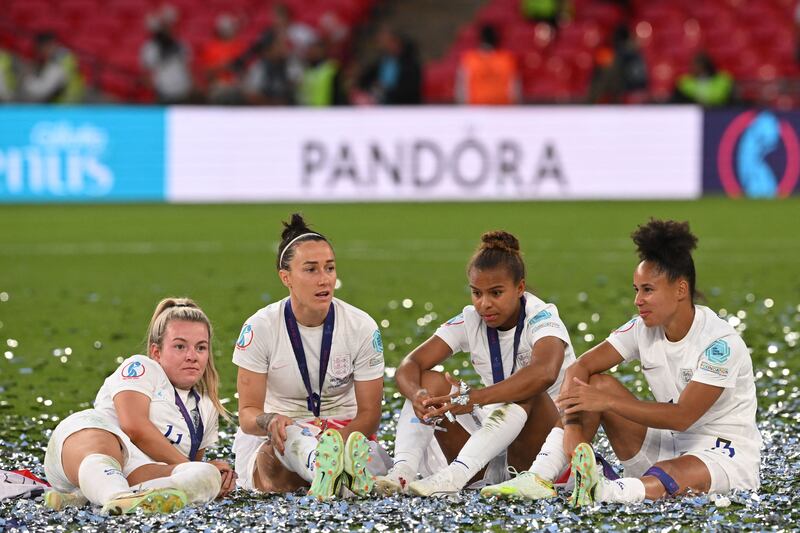 England's players reflect on the pitch after their victory over Germany in the Women's Euro 2022 final at Wembley. Photograph: Justin Tallis/AFP  via Getty Images