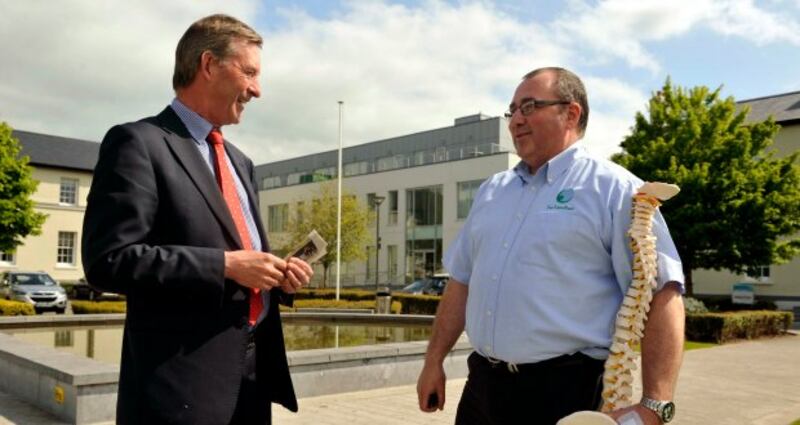 Alan O’Mahony of From Lift to Right chatting with Tom Purcell, Branch Manager, Bank of Ireland Ballincollig.