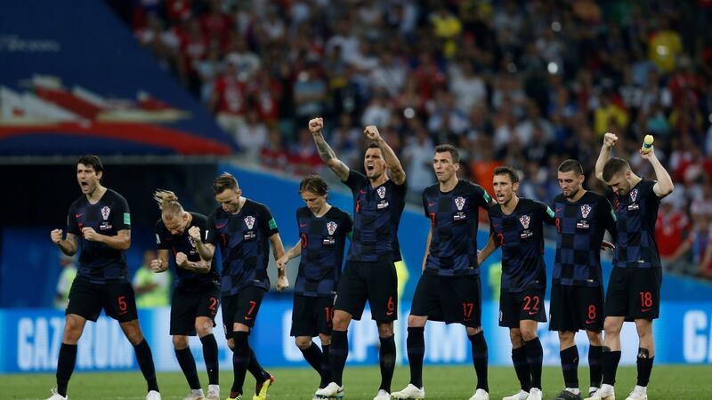 Croatia players celebrate Marcelo Brozovic’s penalty during the shootout. Photograph: Carl Recine/Reuters