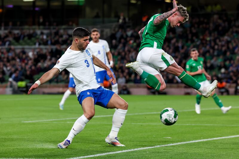 Greece's Konstantinos Koulierakis and Ireland's Sammie Szmodics - Szmodics was busy and sparky in his lone striker role. Photograph: Morgan Treacy/Inpho