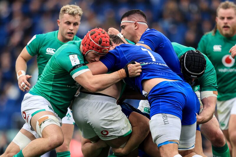 Ireland’s Josh van der Flier in action against Michele Lamaro of Italy. Photograph: Dan Sheridan/Inpho