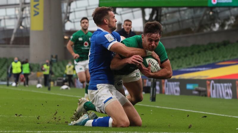 Hugo Keenan muscles his way over to score his second try on debut against Italy. Photograph: Brian Lawless/EPA