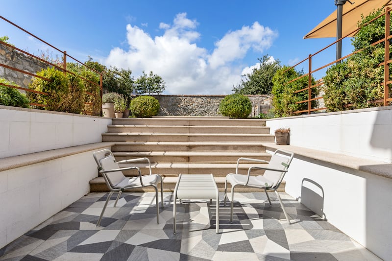 Sunken patio off the den at basement level