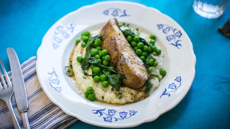 Pan-fried fish with cauliflower mash and garden peas.