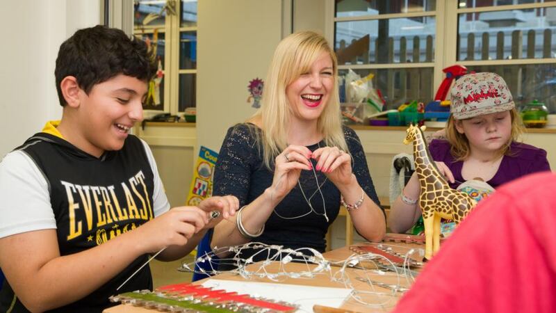 Aoife O’Connor with the children enjoying the workshops during Family Arts Week at the Great Ormond Street Hospital Activity Centre.