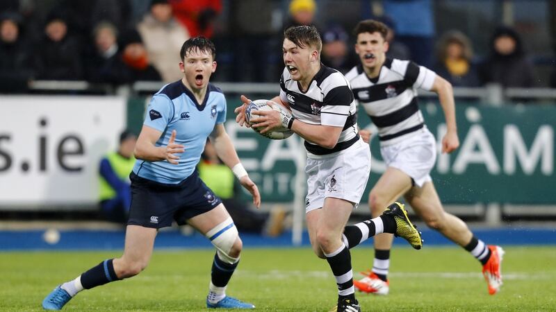 Belvedere’s David Hawkshaw intercepts for a late try against St Michael’s at Donnybrook. Photograph: Colm O’Neill/Inpho