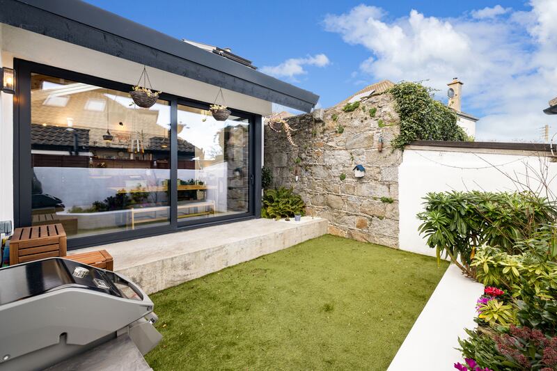 Garden with old granite wall. Photograph: Andrew Nolan